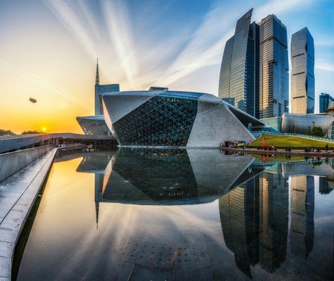 Like the Sydney Opera House, Guangzhou Opera House is also the cultural landmark of the city. Guangzhou Opera House, Wallpaper Horizontal, Japanese Patterns, Amazing Places, Guangzhou, Places Ive Been, Opera House, Circus, Sydney Opera House