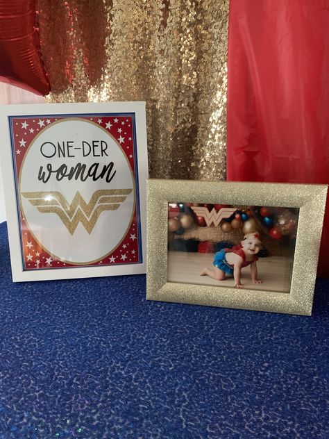 Wonder Woman first birthday party decorations, printable sign Wonder Woman Centerpiece Ideas, Onederwoman First Birthday, Wonder Woman First Birthday, One Der Woman First Birthday, Oneder Woman 1st Birthday Decor, Wonder Woman Birthday Party, Wonder Woman Birthday, First Birthday Sign, First Birthday Party Decorations