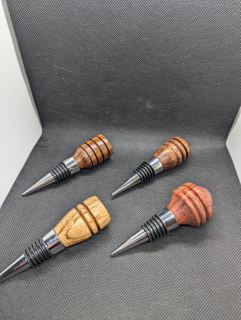 Hand turned wine bottle stoppers. They came from an unlabeled assorted bag of blanks and for that I am sorry. Finished with Walrus oil which is butcher block oil! Diy Wine Bottle, Butcher Block Oil, Wood Bottles, Turning Projects, Lathe Projects, Wine Bottle Diy, Driftwood Crafts, Wood Turning Projects, Wine Bottle Stoppers