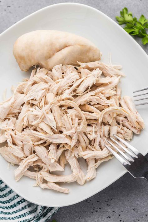 Boiled chicken breast doesn’t have to be tough, rubbery, or boring! Learn how to boil chicken breast that is tender, juicy, flavorful, and super simple to make. Pressure Cook Chicken Breast, Clean Eating Crockpot, Pressure Cooking Chicken, Boiled Chicken Recipes, Slow Cooker Shredded Chicken, Boiled Chicken Breast, Ground Chicken Recipes, Delicious Clean Eating, Shredded Chicken Recipes