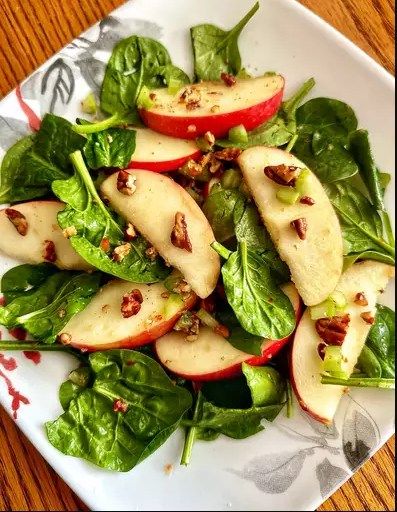 Apple Spinach Salad is a fresh, nutritious dish that combines the sweetness of apples with the earthy flavor of spinach, all tossed in a tangy dressing. This salad is perfect for a healthy lunch or as a side dish for dinner. Here’s how to make it: Apple Spinach Salad Recipe 🍎🍃 Enjoy the delightful blend of crisp apples and tender spinach in this refreshing and easy-to-make salad. Ingredients: For the Salad: 6 cups fresh baby spinach leaves, washed and dried 2 medium apples (such as Fuji ... Fennel And Apple Salad, Wilted Spinach Salad, Shallot Vinaigrette, Bacon Dressing, Arugula Salad Recipes, Apple Salad Recipes, Sliced Apples, Wilted Spinach, Pecan Salad