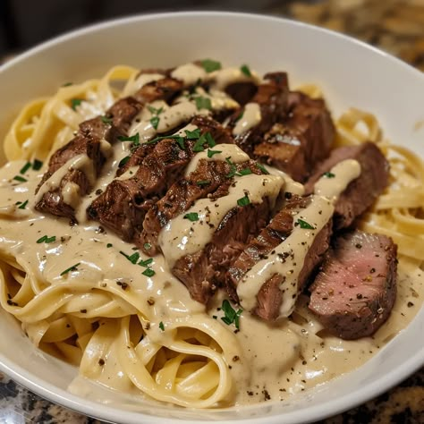 Creamy Cajun Steak Alfredo is a bold, flavorful dish with tender steak, spicy Alfredo sauce, and pasta. Try it tonight for an unforgettable Steak Gorgonzola Alfredo, Gorgonzola Alfredo, Firehouse Meals, Steak Gorgonzola, Creamy Parmesan Sauce, Food Hub, Creamy Parmesan, Parmesan Sauce, Food Fantasy