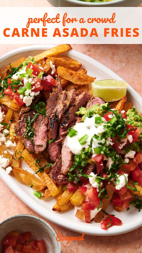 Get ready to dive into a culinary fiesta with these carna asada fries. A mountain of oven baked Mexican fries is heaped with juicy carne asada with creamy guacamole and a medley of fresh toppings, perfect for feeding a crowd. Carna Asada, Air Fryer Goat Cheese, Carne Asada Fries Recipe, Roast Broccoli, Mexican Fries, Goat Cheese Balls, Oven Baked French Fries, Creamy Guacamole, Carne Asada Fries