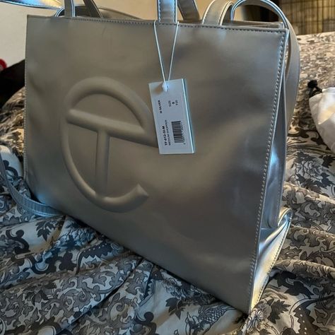 Silver telfar medium Silver Telfar, Placement Outfits, Telfar Bags, Telfar Bag, Telfar Handbags, Girly Bags, Fancy Bags, Bag Collection, Simple Trendy Outfits