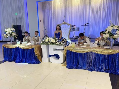 Blue Quinceanera Centerpieces, Royal Blue And White Quinceanera Theme, Gold And Blue Quinceanera Decorations, Blue Quince Theme Ideas, Quince Blue Decorations, Quince Themes Blue, Royal Blue And Gold Sweet 16 Dresses, Royal Blue 15 Decorations, Royal Blue And Silver Quinceanera Theme