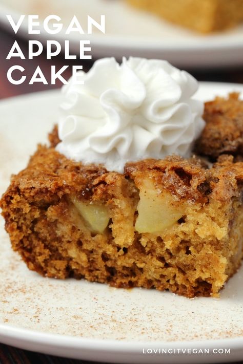 Light and fluffy vegan apple cake with a cinnamon sugar topping. Packed with fresh apple flavor and absolutely divine served warm with vegan whipped cream. | lovingitvegan.com Vegan Apple Cake, Vegan Whipped Cream, Vegan Oatmeal, Applesauce Cake, Vegan Apple, Vegan Eats, Fresh Apples, Apple Cake, Sheet Cake