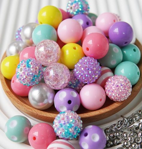 PRICES MAY VARY. Versatile: These 20mm Bubblegum Beads come in enough styles and colors to be used for a variety of creative projects, including making beadable pens, jewelry, keychains, and other decorative items. Colorful: Like bubble gum beads, our chunky beads are brightly colored and visually appealing. Using our bubble beads to make some colorful and eye-catching accessories can be a draw for attention and for customers if you're making re-sell crafts. Unique Texture: The chunky texture of Bead Pens, Bubble Beads, Crafts Unique, Pen Making, Beadable Pens, Beadable Products, Bubblegum Beads, Chunky Beads, Creating Jewelry