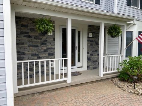 This customer wanted to upgrade and transform their front porch walls with our faux stone panels. They selected our Northern Slate Stacked Stone panels for this porch wall siding transformation. Visit our Inspiration Gallery for more photos of this project! #GenStone #DIY #MyGenStoneDIY #FauxStonePanels Faux Outdoor Stone Panels, Stacked Stone Front Porch, Stone Veneer Front Porch, Faux Brick Front Porch, Faux Stone Panels Exterior Front Porches, Outside Entryway Ideas Front Porches, Outside Entryway Ideas, Faux Stone Panels Exterior, Porch Wall Design