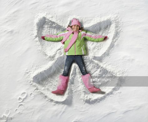 Snow Angel Stock Photos and Pictures | Getty Images Snow Photoshoot, Baby In Snow, Baby Snowsuit, Snow Pictures, Snow Angel, Winter Preschool, Winter Photoshoot, Snow Outfit, Winter Photos