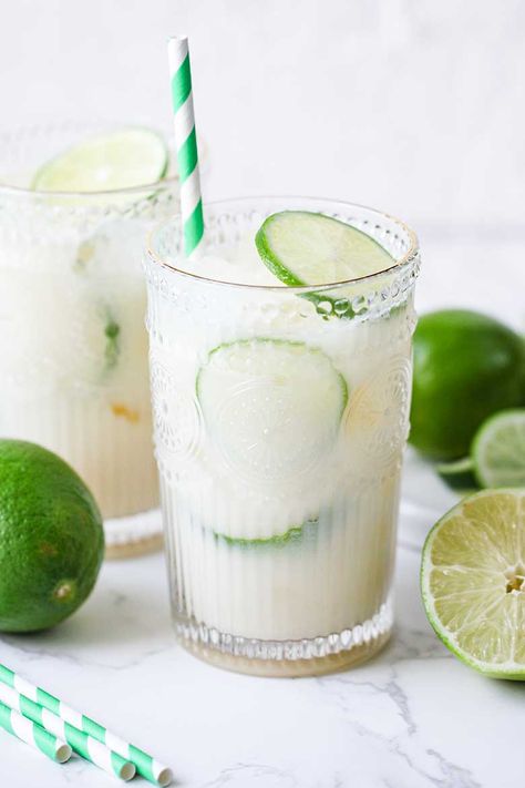 Coconut Limeade, Friday Cocktails, Virgin Pina Colada, Limeade Recipe, Pina Colada Recipe, Coconut Drinks, Fancy Drinks, 200 Calories, Limes