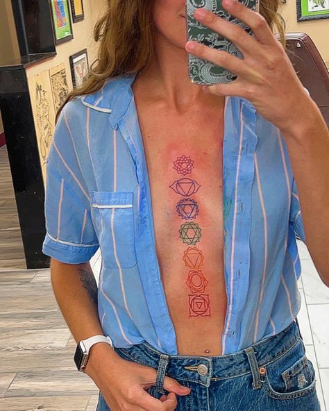 Chakra Tattoo Thigh, Chakras Down Spine Tattoo, Chest Chakra Tattoo, Chakra Tattoo Sternum, Sternum Chakra Tattoo, Chakra Tattoo Spine Color, Anahata Chakra Tattoo, Chakra Tattoo Spine, Throat Chakra Tattoo