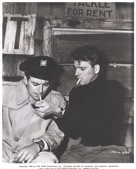 John Bromfield and Burt Lancaster share a smoke on the set of 1948's "Sorry, Wrong Number," an awesome, suspenseful film starring Barbara Stanwyck. John Bromfield, Burt Lancaster Movies, Sorry Wrong Number, Burt Lancaster, Movies Photo, Ann Sheridan, Katherine Hepburn, Movie Club, Barbara Stanwyck