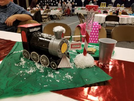 Polar Express Ward Christmas party table centerpiece Polar Express Table Centerpieces, Ward Activities, Polar Express Christmas Party, Ward Christmas Party, Candy Themed Party, Christmas Party Table, Party Table Centerpieces, The Polar Express, Polar Express