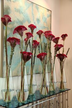 simple red centerpieces Celosia Floral Arrangements, Celosia Arrangement, Hotel Flower Arrangements, Red Centerpieces, Hotel Flowers, Corporate Flowers, Flower Installation, Vase Arrangements, The Grove