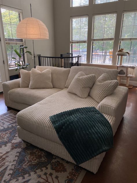 White corduroy sectional couch in loft apartment California home interior design L Shaped Couch Apartment, Corduroy Couch Decor, Comfy Corduroy Couch, Aesthetic Sectional Sofa, Courdory Sofa, Cozy Couch Corner, Cozy Modern Couch, Comfy Cozy Couch, Caddy Corner Couch In Living Room