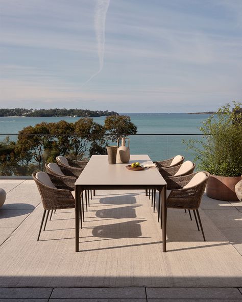 Crafted for comfort, the Quay Outdoor Dining Table is designed for long lunches and memorable dinner parties. Pair with the Quay Outdoor WeatherWeave™ Dining Chair for lasting support.⁣ ⁣ Featuring⁣ Quay Ceramic Dining Table in Earth/Fog ⁣ Quay Outdoor Dining Chair in Pebble Weather Weave and Rock⁣ Cottesloe Rug in Natural Ceramic Dining Table, Outdoor Dining Chair, Beach View, Water Views, Outdoor Dining Area, Outdoor Dining Table, Outdoor Dining Chairs, Dinner Parties, Outdoor Dining