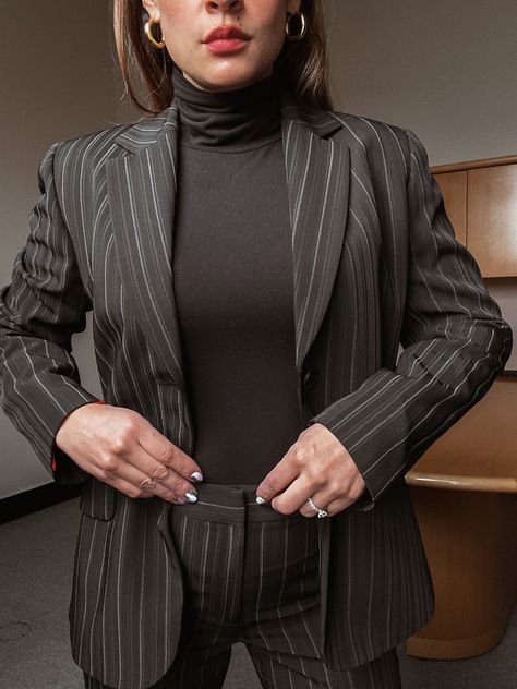 Close up of woman wearing black and grey pinstriped suit with black turtleneck with minimal jewelry Turtle Neck Suit Women, Prom Fits, Prom Outfit, Striped Suit, Black Turtle Neck, Womens Suits Business, Pinstripe Suit, Striped Turtleneck, Prom Outfits