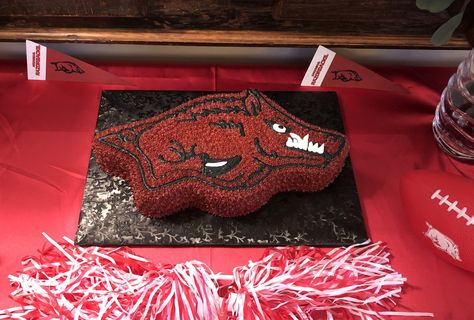 Wooo Pig Sooie! This Arkansas Razorback cake was the groom’s cake for a wedding celebration! It’s white cake with buttercream frosting. Taste and see that the Lord is good! Cristin’s Cake Creations appreciates being able to serve you for your special occasion! Razorback Cake, Groomsman Cake, Cake With Buttercream Frosting, Arkansas Razorback, Cake With Buttercream, Groom Cake, Arkansas Wedding, Taste And See, The Lord Is Good