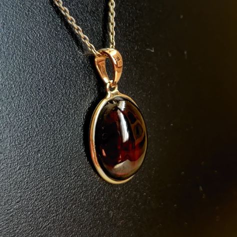 ITEM DESCRIPTION: >> The Pendant is made from Solid 14K Yellow Gold. Gemstone used is absolutely natural and ethically sourced. >> Natural Garnet in cabochon cut and oval shape with bezel setting is studded on it with utmost precision. >> This is a minimalist design and is absolutely hassle-free and everyday jewelry. Gem: Garnet Gem size: 12x15 mm oval Gem weight: 9.48 carats Gold purity: 14K (58.33% approx.) Gold weight: 0.50 grams Gross weight: 2.40 grams The Gold purity is guaranteed and it c Increase Endurance, Blue Statement Necklace, Physical Strength, Handmade Jewelry Box, Garnet Gem, Lapis Lazuli Necklace, Garnet Pendant, Garnet Necklace, Garnet Jewelry