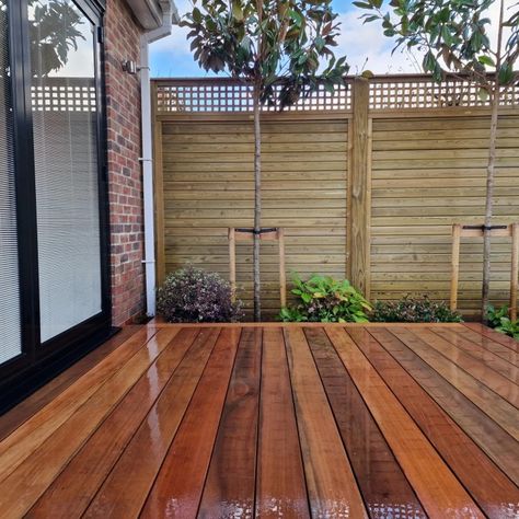 Yellow Balau decking installation side view looking across deck to new Jacksons Fencing Balau Decking, Fence Trellis, Trex Composite Decking, Decking Options, Redwood Decking, Garden Decking, Deck Framing, Richmond Upon Thames, Lattice Trellis