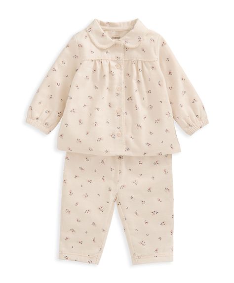 Get your little one all snuggled up for bedtime with our nightwear range. Our perfectly printed pyjama sets are crafted from soft 100% cotton and finished with comfy features that won't get in the way of naptime. Ditsy cherries print brushed cotton pyjamas. Top with peplum shape, elasticated cuffs and picot trim detail on neck and cuffs. Bottoms with gathered cuffs, picot trim detail and elasticated waist.Composition:100% cottonWashcare:40 degree wash. Do not bleach. Cool tumble dry. Cool iron. Do not dry clean. Wash dark colours separately. Iron on reverse.Keep Away From Fire Brushed cotton Elasticated waist and cuffs Picot trim detail Clothing & Accessories > Clothing > Baby & Toddler Clothing > Baby & Toddler Sleepwear Baby Trends, Baby Pyjamas, Top With Peplum, City Break Outfit, Papa Baby, Pyjama Sets, Dark Colours, Toddler Clothing