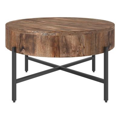 This industrial-inspired coffee table takes a contemporary spin with the hand-crafted finish on the beautiful and sustainable mango wood top. The black iron provides strong, sturdy support and lends extra style credit with the cross-base design. Overall a gorgeous piece to place in a formal or casual living room setting. | Loon Peak® Contemporary Solid Wood Coffee Table In Natural Wood / Metal in Brown, Size 18.0 H x 33.0 W x 33.0 D in | Wayfair Casual Living Room, Mango Wood Coffee Table, Round Wood Coffee Table, Black Coffee Tables, Rustic Coffee Tables, Solid Wood Coffee Table, Table Cafe, Wood Coffee Table, Living Table