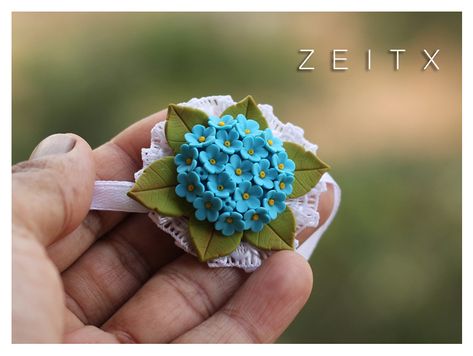 polymer clay floral rakhi by zeitx Clay Rakhi, Clay Embroidery, Handmade Rakhi Designs, Polymer Clay Embroidery, Handmade Rakhi, Rakhi Design, Polymer Clay Flowers, Clay Flowers, Flower Jewelry