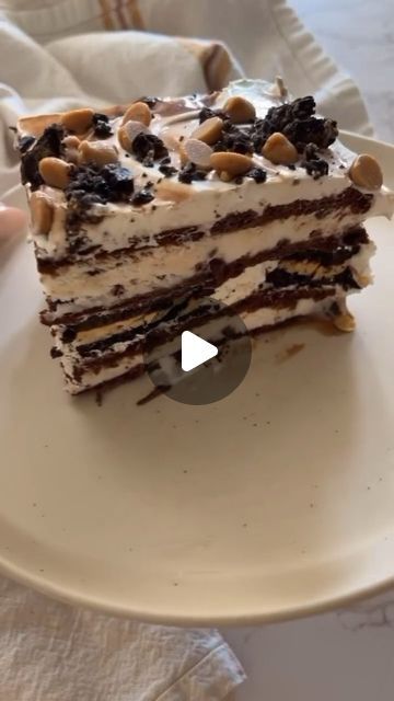 Kodaskitchen on Instagram: "Ultimate Ice Cream Cake 
Credit for this delicious recipe @spread.the.grub

#### Ingredients:
- 12 ice cream sandwiches
- 2 cups of whipped cream
- 15 Oreo cookies, crushed
- Chocolate syrup
- Peanut butter chips
- Extra Oreo crumbs for topping

#### Instructions:
1. **Prepare Your Dish**: Line a freezer-safe dish with parchment paper for easy removal later.
2. **First Layer**: Place a layer of ice cream sandwiches on the bottom of the dish. Cut them as needed to fit snugly.
3. **Whipped Cream and Oreos**: Spread a generous layer of whipped cream over the ice cream sandwiches. Sprinkle a layer of crushed Oreo cookies on top.
4. **Second Layer**: Add another layer of ice cream sandwiches on top of the whipped cream and Oreos.
5. **Repeat**: Spread another layer o Crushed Oreo, Icebox Cake Recipes, Ice Cream Sandwiches, Icebox Cake, Traditional Cakes, Peanut Butter Chips, Icecream Bar, Ice Cream Desserts, Chocolate Syrup