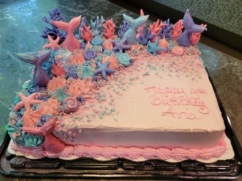 White cake with strawberry filling and whipped topping along with fondant decorations Mermaid Themed Sheet Cake, Mermaid Birthday Sheet Cake Ideas, Mermaid Sheet Cake Ideas, Mermaid Sheet Cake, Mermaid Sheets, Mermaid Pool Parties, Ariel Birthday Party, Mermaid Birthday Cakes, Mermaid Theme Birthday Party