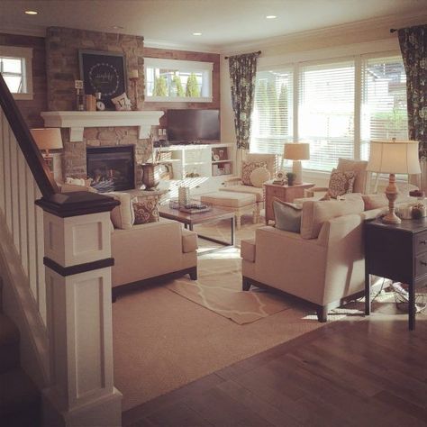 Beautiful family room with stone fireplace and neutral shades kellyelko.com Double Rugs, Fieldstone Fireplace, Real Fireplace, Staircase Detail, Floor Transition, White Mantel, Basement Layout, High Windows, Living Room Layout