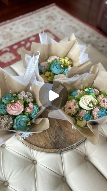 Connie Pacifico | Floral Cupcake Artist 🇨🇦 on Instagram: "When you order a 7-cupcake bouquet, you'll delight in the beauty of floral buttercream cupcakes, which are nestled in a reusable galvanized basket designed to enhance presentation and ease handling. Bon appétit! . . . . . . #cupcakes #cakes4cakelovers #flowersofinstagram#buttercreamflowers #reelsinstagram #cupcakebouquet #bakingtips #bouquetwrapping #floralcupcakes #edibleart #cupcakeart #cakedecorating #flowercupcakes #cakeart #reels #trending #likes4likes #trendingreels #customcupcakes #edibleflowers #cupcakedecorating #cupcakelove #cakeartist #bouquet#cupcakestyles #buttercreamcupcakes#candiacmaville #montrealcupcakes #montreal" Floral Cupcake Bouquet, Cupcake Bouquet Centerpiece, Cupcake Case Flowers, Flower Cupcake Boquets, Cupcake Arrangements, Cake Basket, Baked Bouquet Cupcake Flower, Buttercream Cupcakes, Floral Cupcakes