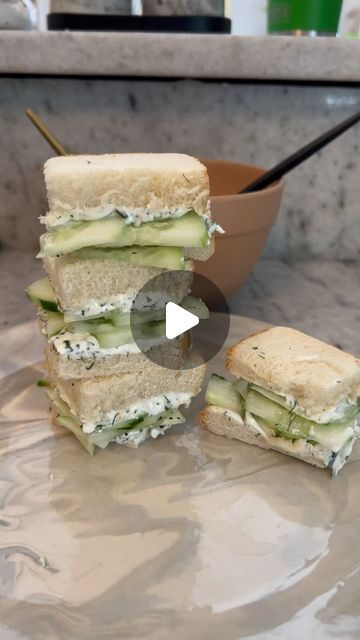 Natalie Mason on Instagram: "Let’s make mini cucumber sandwiches! I love these in the Summer- they are perfect for the boat, the beach or to serve as an appetizer at your next party! You can cut the crust off that’s the traditional Southern way but sometimes I leave it in! These mini sandwiches are so crisp, fresh and refreshing! Cut in half or quarters and enjoy!! Recipe below:) #masoneats #cucumbersandwiches MINI CUCUMBER SANDWICHES 1 English cucumber peeled and sliced thinly 1 cup whipped cream cheese 2 tablespoons fresh dill 2 tablespoons chives 1/2 teaspoon salt 1/2 teaspoon pepper 1/4 teaspoon garlic powder Juice of 1/2 a lemon White Bread In a bowl mix the cream cheese, dill, chives, salt, pepper, garlic powder and lemon juice. Spread a layer on both sides of the brea Cucumber Dill Sandwiches, Mini Cucumber Sandwiches, Cucumber Cream Cheese Sandwiches, Brie Sandwich, Cream Cheese Sandwiches, Cucumber Dill, Mini Cucumbers, Cucumber Sandwiches, Mini Sandwiches