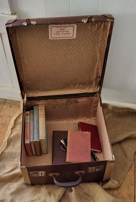 Lovely old brown square suitcase. This suitcase is made by Fred Dodge North Richmond Victoria. It is perfect as a display piece or as storage. It measures 39cm square x 20cm high. It has leather holders on the inside and stitching on the  outside. It does have some damage on the inside and some rust on the closer( please see photos) but this adds to its rustic appeal. Book Suitcase, Vintage Brown Aesthetic, Vintage Suitcase Decor, Suitcase Display, Old Luggage, Everyday Bag Essentials, Victorian Men, Suitcase Storage, Romans 8:31