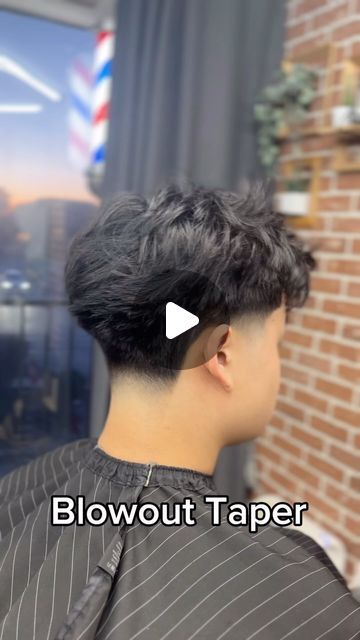 Romuel Cuevas on Instagram: "Don’t tell me… again?!?! Blowout tapah strikes again ⚡️  #barber #fade #blowout #middlepart #flow #fringe #taper #fluffy #perm #curlyhair #inspo #inspiration #inspohaircuts #inspocuts #summer #summerlook #trendingcuts #transformation #barbersharps #squareblockstudio" Corte Blowout Hombre, Blowout With Mid Taper, Blowout Taper With Textured Fringe, Loose Perm Boys, Blowout Taper Fringe, Mid Blowout Taper, Blowout Taper Men Curly Hair, Blowout Fringe, Blowout Taper Straight Hair