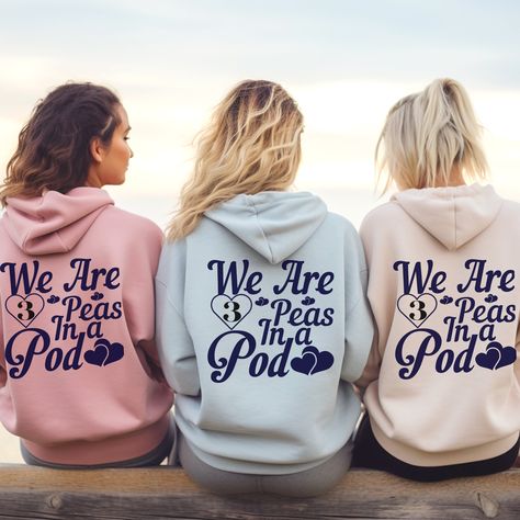 Squad Goals: The Ultimate Best Friend Hoodie Collection (Sold Separately) Celebrate your unbreakable bond with these customizable best friend hoodies! This exclusive collection features three separate hoodies, each designed to rep your unique friendship. Features: Cozy Comfort: Made from premium fleece for ultimate warmth and relaxation. Personalized Style: Sleeves: Each hoodie features a designated space on the sleeve for your chosen names, letting everyone know who rocks this awesome crew. Fro Funny Girls Trip Shirts, Best Friend Trio, Friend Sweatshirts, Friend Trio, 3 Peas In A Pod, Bff Hoodies, Best Friend Sweatshirts, Best Friend Hoodies, Sarcastic Clothing