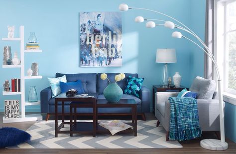 Urban Barn Blue Wall Decor Living Room, Blue Living Room Ideas, White Shelving Unit, Blue Walls Living Room, Fireplace Facing, Modular Coffee Table, Cream Living Rooms, Blue Accent Walls, Blue Living Room Decor