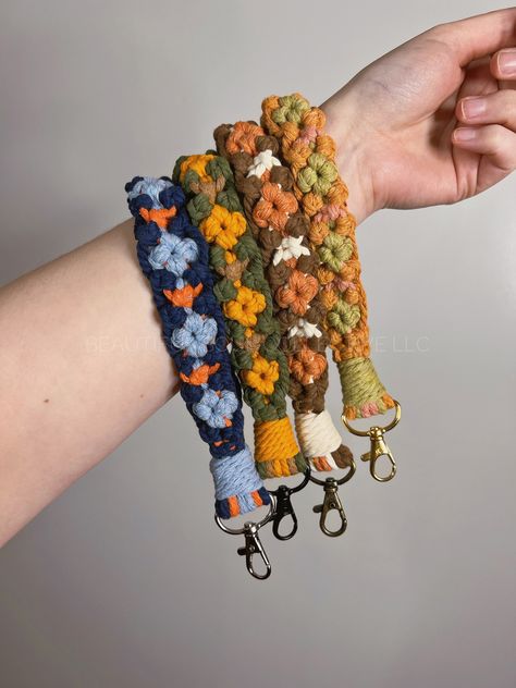 Inspired by crochet granny squares, wristlet keychains are a beautiful and unique way to carry your keys, ID cards, key fob or anything else so you can be hands free!Choose from over 30 colors to express your creativity.When ordering please specify what color you want for cords #1, #2 & #3.Message me if you have any questions!* Cleaning & Care: Hand wash with mild soap if needed *Each wristlet is made to order using 100% recycled cotton macrame cord.❀ All items are handmade and may have slight v Crochet Wrist Lanyard Pattern, Crochet Wallet Keychain, Crochet Keychain Wristlet Pattern Free Easy, Crochet Granny Square Keychain, Hand Made Keychains, Crochet Wristlet Pattern Free, Crocheting Keychain, Knit Keychain, Crochet Key Fob