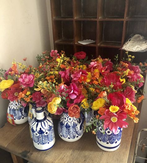 Mexican  inspired pottery with faux flowers . Centerpieces Mexican Centerpiece Ideas Wedding, Mexican Wedding Flowers Centerpieces, Mexican Pottery Wedding, Clase Azul Flower Vase, Talavera Table Numbers, Mexican Flower Vase, Mexican Centerpiece, Flowers Centerpieces, Talavera Pottery