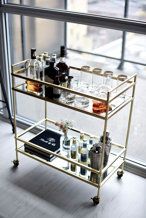 Not Your Standard Home with Kayla Seah | west elm Bar Cart Styling Apartments, Bar Cart Ideas, Kayla Seah, Bar Trolley, Gold Bar Cart, Cart Ideas, Condo Living Room, Bar Inspiration, Bar Cart Styling