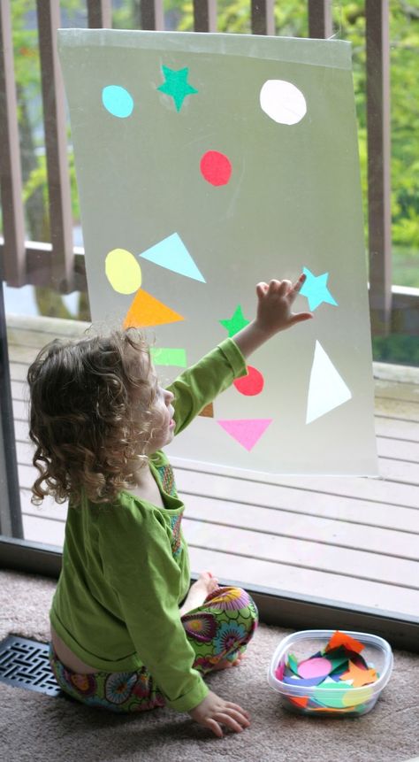 Contact Paper Window Art from Fun at Home with Kids #math #shapes #preschool Contact Paper Window Art, Contact Paper Window, Rainy Day Activities, Toddler Play, Toddler Art, Toddler Fun, Contact Paper, Window Art, Preschool Art