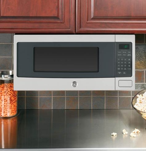 Under-Cabinet mounted microwave. Microwave Under Cabinet, Ge Kitchen Appliances, Mounted Microwave, Ge Profile Appliances, Microwave Cabinet, Microwave Shelf, Black Microwave, Countertop Microwave Oven, Stainless Steel Microwave