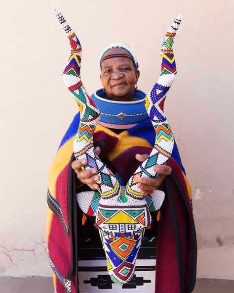 Mama Anna Skhosana holds one of her incredible beaded kudu heads in KwaMhlanga, the spiritual home of the Ndebele tribe. Photo by @2summers. #MeetSouthAfrica Safari Furniture, Ndebele Art, South African Women, Africa Culture, Pillows Design, Spiritual Home, South African Art, African Crafts, African Artists