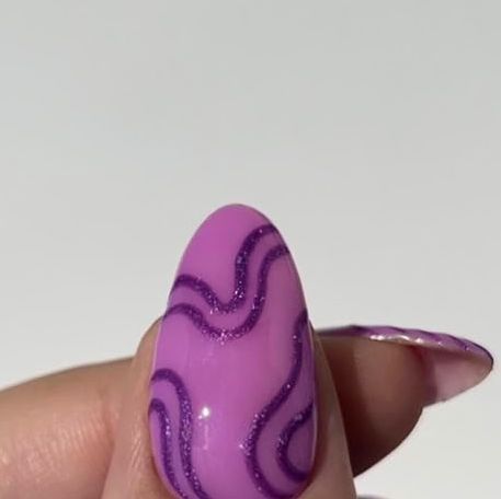 the nailologist🍒🌸🦋🌈✨ on Instagram: "sparkly swirly purple nails 💜🔮🦄 rings from @indigolune (gifted)✨ #nailinspo #purplenails #nailinspo #nailart #nails #nailtutorial" Swirly Nail Designs With Glitter, Light Purple Swirl Nails, Purple Swirls Nails, Purple Nails Swirl Design, Purple Swirly Nails, Nails Rings, Nailinspo Nailart, Nail Ring, Nail Tutorials