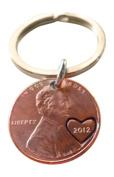 PRICES MAY VARY. Perfect for couples 12 year anniversary gift (12 years gift, 12th year gift), or for a best friend gift The US one cent coin is called a penny and is a symbol of luck. Packaged on a card with saying "What a Lucky Year!" The copper coin is a USA one cent penny 20 mm diameter. Handmade item, engraved, made in USA, net weight: about 5g. A 2012 USA penny (one cent) keychain with an engraved heart around the year. These are great gifts for you and your significant other! The US penny 12 Year Anniversary, 12 Year Anniversary Gifts, 11 Year Anniversary Gift, Penny Keychain, 11 Year Anniversary, Couples Keychain, 8th Wedding Anniversary, 5 Year Anniversary Gift, 7th Wedding Anniversary