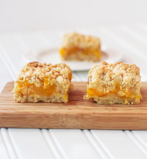 From Calculu∫ to Cupcake∫ | Peach Cobbler Bars | http://www.fromcalculustocupcakes.com Peach Rice, Peach Cobbler Bars, Cobbler Bars, Krispy Treats, Rice Krispy, Buttery Cookies, Peach Recipe, Cookie Bar Recipes, Peach Cobbler