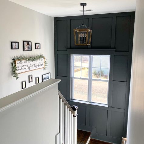 Board And Batten Floor To Ceiling, Black Accent Wall Stair Landing, Iron Ore Board And Batten, Iron Ore Sherwin Williams Ceiling, Iron Ore Entryway, Ceiling Board And Batten, Stairwell Accent Wall With Window, Staircase Accent Wall Color, Stairway Accent Wall With Window