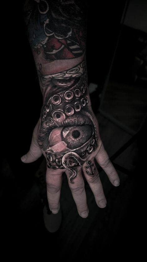 Eye with octopus tentacles on hand black and grey tattoo Black And Grey Tattoo, Octopus Tentacles, Grey Tattoo, Black And Grey Tattoos, Hand Tattoos, Octopus, Tattoos For Guys, Black And Grey, Tattoos