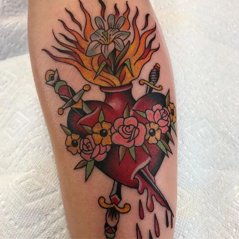 Tattoo uploaded by Tattoodo • Tattoo by Chris Stuart #ChrisStuart #sacredhearttattoos #sacredhearttattoo #sacredheart #heart #fire #love #religious #color #traditional #rose #flower #iris #sword #blood • Tattoodo Heart Tattoo Ankle, Eye Tattoo Meaning, Sacred Heart Tattoo, Tattoo For Boyfriend, Sacred Heart Tattoos, Saved Tattoo, Dagger Tattoo, Heart Tattoo Designs, Traditional Tattoo Art