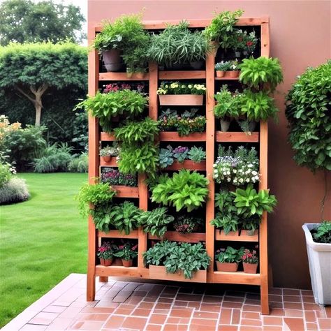 40 Vertical Garden Ideas for Indoor and Outdoor Spaces Living Garden Walls Outdoor, How To Make A Living Wall Outdoors, Outdoor Wall Herb Garden Ideas, Back Porch Gardening Ideas, Herb Garden Wall Outdoor, Vertical Garden Wall Balcony, Vertical Garden Diy Outdoor, Vertical Garden Wall Outdoors, Herb Planters Outdoor