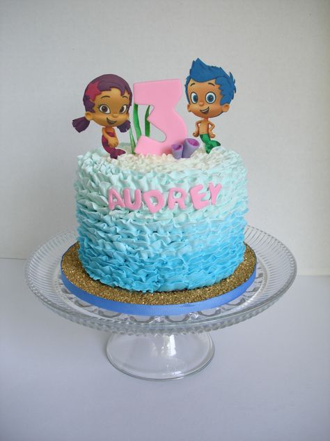 Bubble Guppies buttercream ruffle cake OMG LOVE THIS! (Use real figurines NOT fondant!) Bubble Guppies 1st Birthday Party Ideas, Bubble Guppies Birthday Party Ideas Cake, Bubble Gubbies Cake, Bubble Guppy Cake, Bubble Guppies Cookies, Bubble Guppies Birthday Theme, Bubble Guppies Birthday Cupcakes, Bubble Guppy Cupcakes, Bubble Guppies Cupcakes